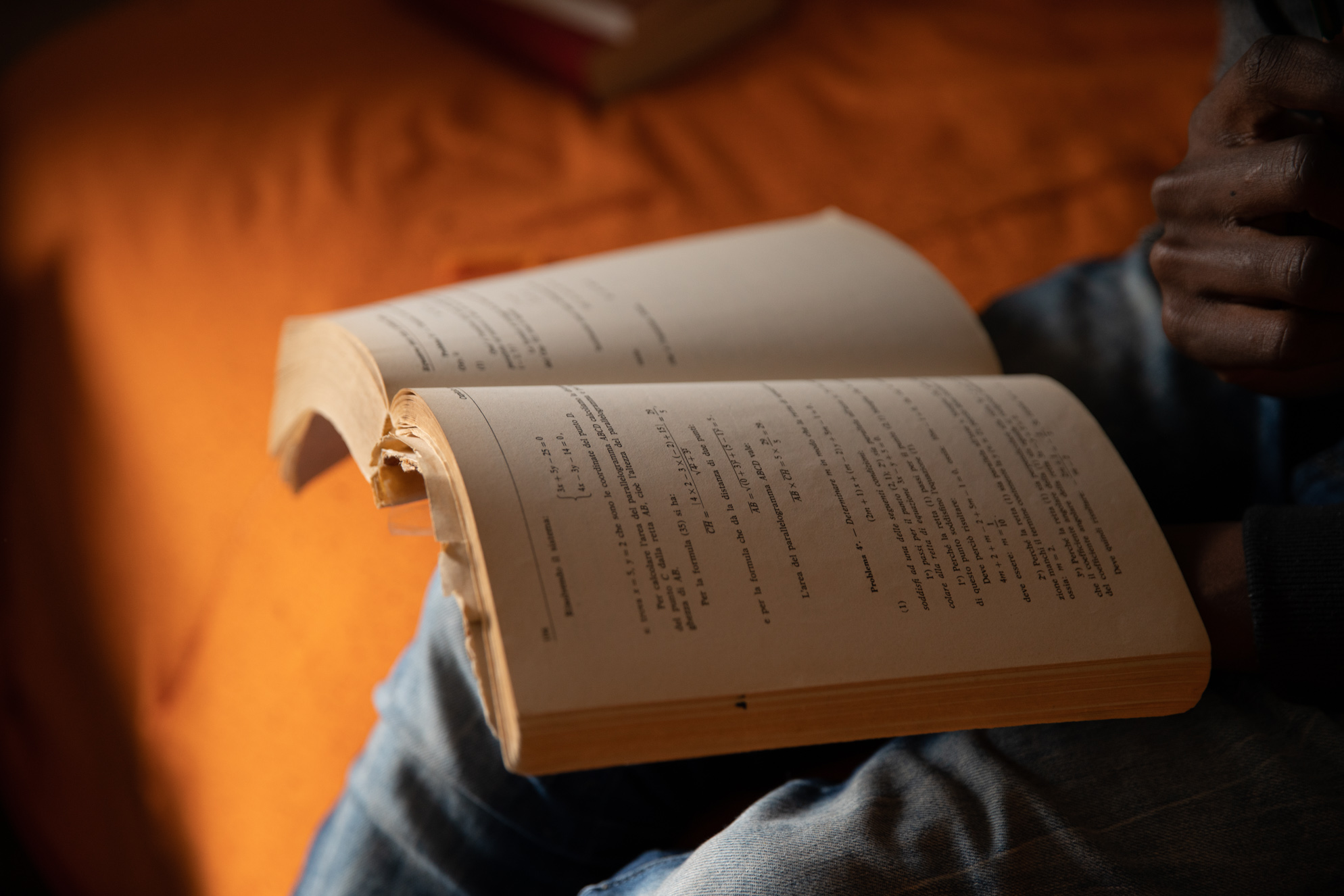 Having dropped out in Cameroon at age 10, Fidèle has particularly focused on schoolwork since his arrival to Italy. In less than two years, Fidèle has become fluent in Italian (in addition to the French, English and Cameroonian languages and dialects that he spoke prior to his journey) and has obtained a middle-school degree that has allowed him to pursue a technical specialization in computer science.