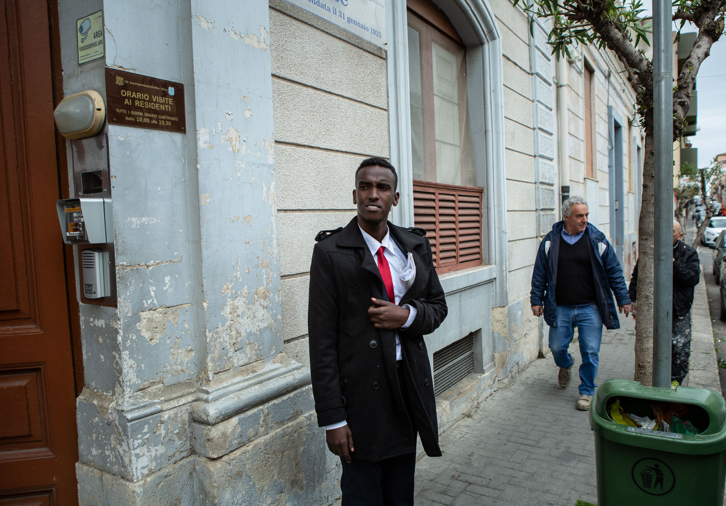 Abdirahman stops by the Chiesa Evangelica Valdese (Waldensian church) that houses the offices of the SPRAR (secondary reception center) where he lives. March 20, 2019.