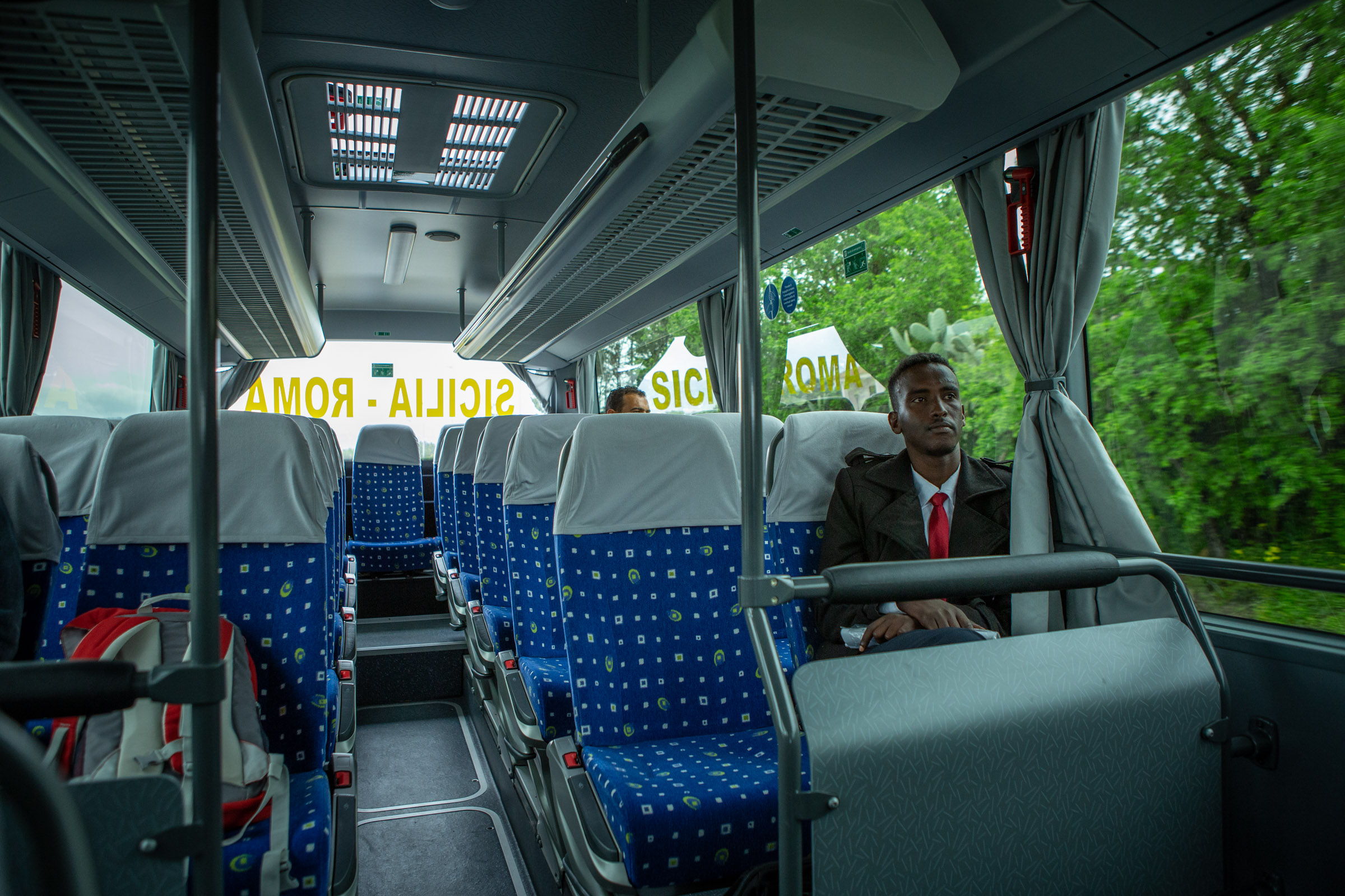 Abdirahman takes the long-distance bus between his reception center in Victoria, Sicily, and the Central Police Station, in Ragusa.